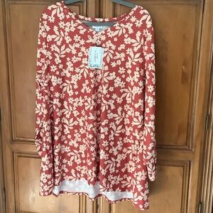 LuLaRoe woman’s size 2x Rust orange Long-Sleeve Floral swing style Top